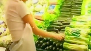Daring Blonde Girl Masturbates with Cucumber in Public Shop