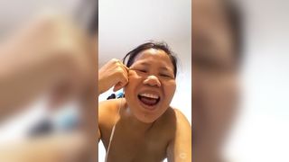 Mature thai playing with herself after shower