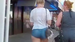 Girl with a bigger ass in tight shorts