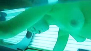 Woman spied in tanning bed