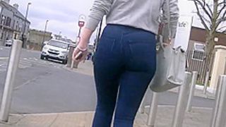 Candid teen walking in tight jeans