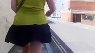 Wind lifts upskirt and exposes butt