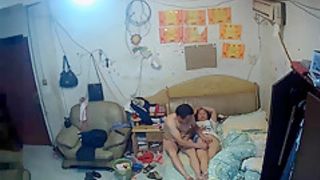 The rented uncle goes to bed with his wife who is playing with her mobile