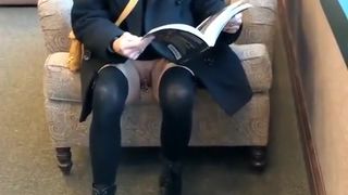 Exhibitionist woman at book store