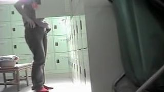 Charming Asian caught changing in the locker room