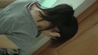 Dark haired asian chick pissing on hidden cam
