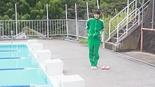 Japanese girl swim in pool with yellow swimsuit soft
